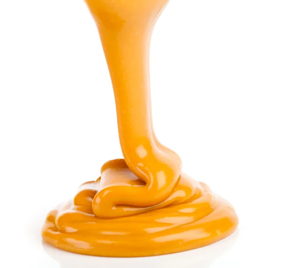 Liquid caramel, isolated on white background — Stock Photo, Image