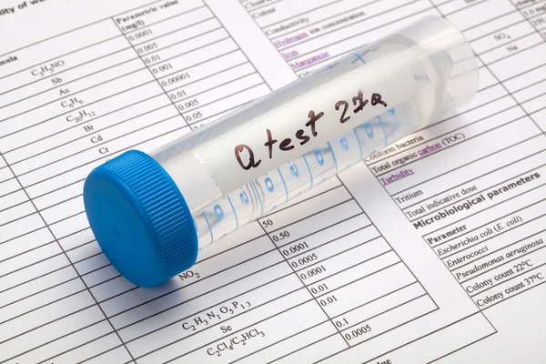 Drinking water in the test tube for chemical and microbiological — Stock Photo, Image