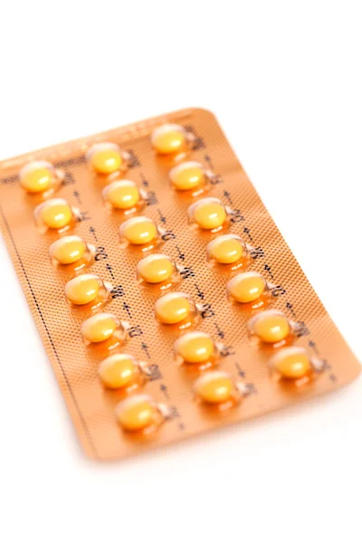 Compresse (pillole anticoncezionali) su sfondo bianco — Foto Stock