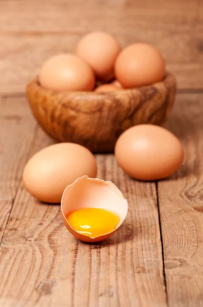 Yolk of egg on wooden background — Stock Photo, Image