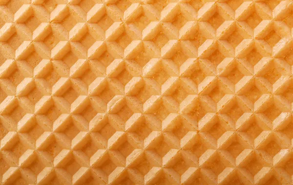 Struktur einer gebackenen goldenen Waffel Hintergrund — Stockfoto