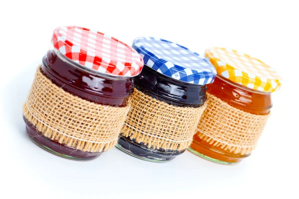 Tasty berry jam, isolated on white — Stock Photo, Image