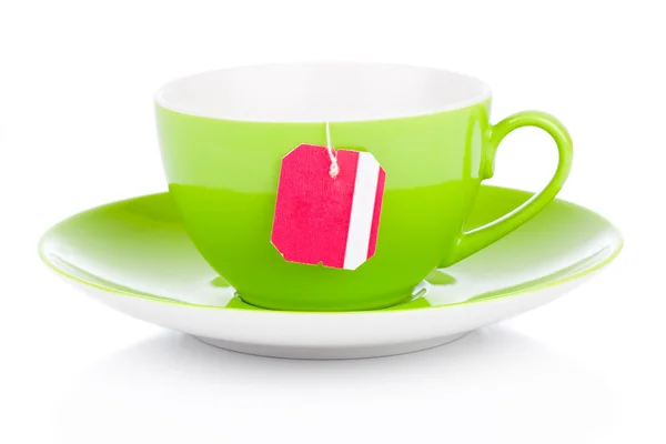 Groene thee beker met theezakje. geïsoleerd op witte achtergrond — Stockfoto