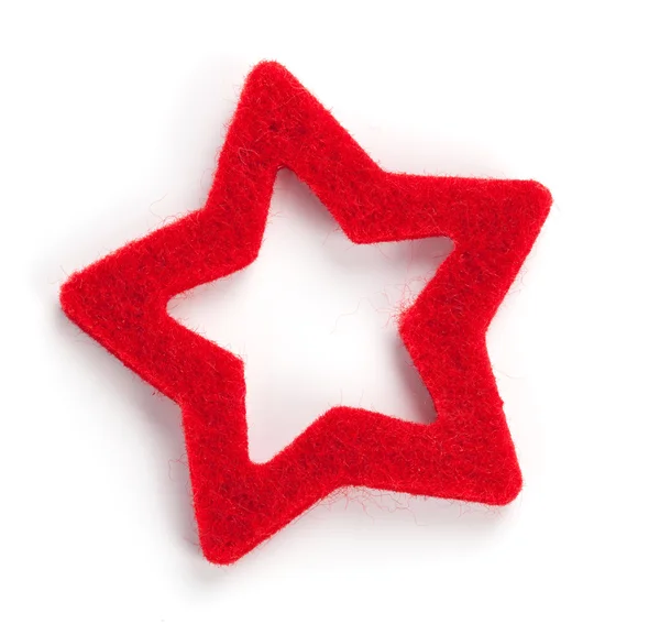 Rudá hvězda ve tvaru Vánoční dekorace, na bílém pozadí — Stock fotografie