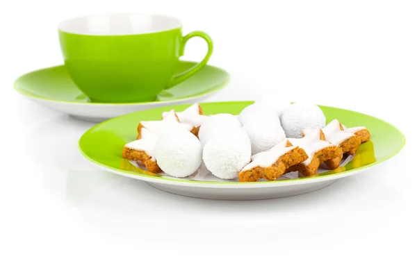 Galletas estrella de canela de Navidad en plato verde — Foto de Stock