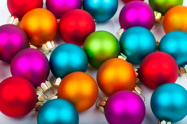 Multi-colored Christmas baubles as a background — Stock Photo, Image