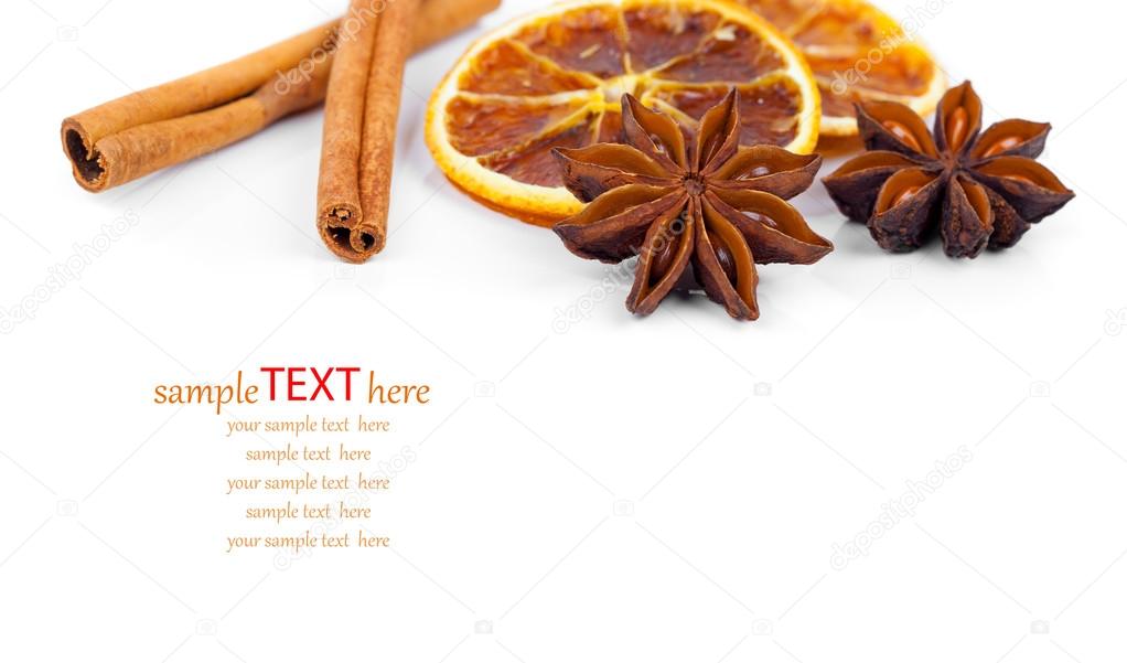 Dry orange, cinnamon and Star Anise with copy space, on white ba