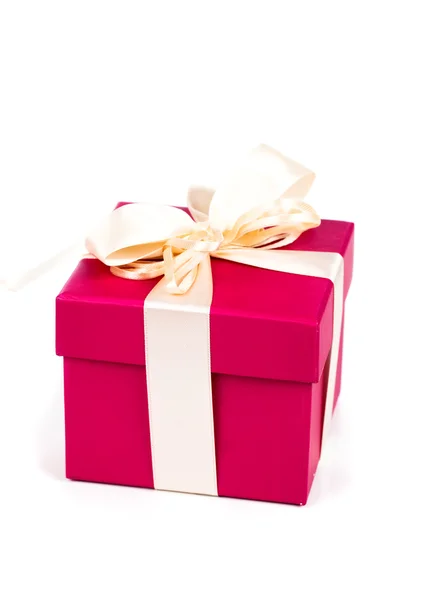 Red gift box with ribbon bow isolated on white — Stock Photo, Image