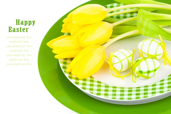 Easter eggs in a plate, on a white background — Stock Photo, Image