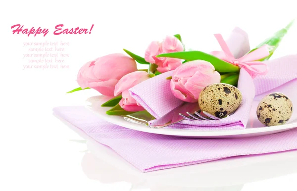 Pink tulips with quail eggs in a plate, on a white background. r — Stock Photo, Image