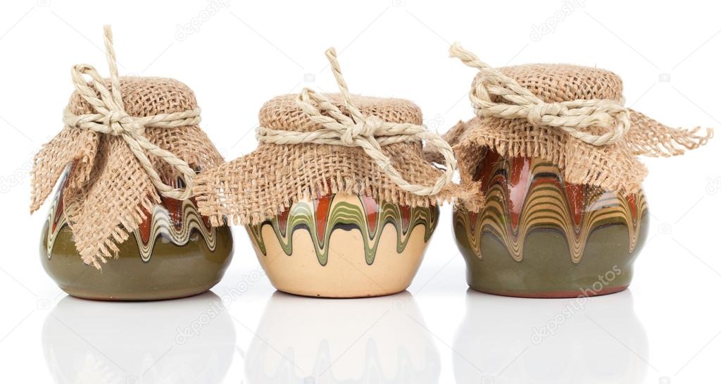 old kitchenware, jug (clay pots), on white background
