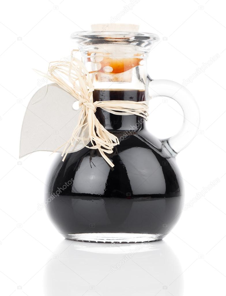 maple syrup in glass bottle or herbal syrup, ardent drink, mixtu