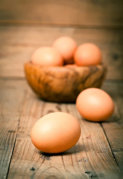 Eggs on wooden background — Stock Photo, Image