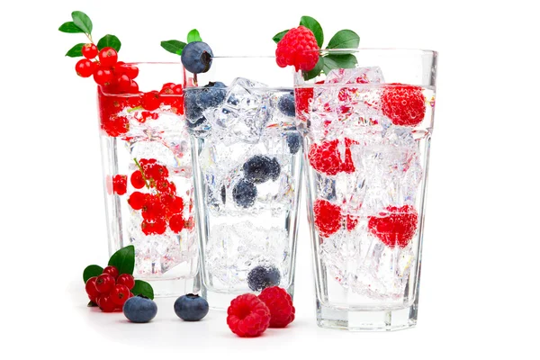 Juice, cocktail with currant, raspberry, blueberry and ice, iso — Stock Photo, Image