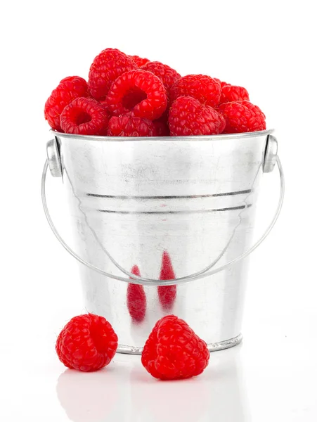 Raspberries berries in a metal bucket, isolated on white backgro — Stock Photo, Image