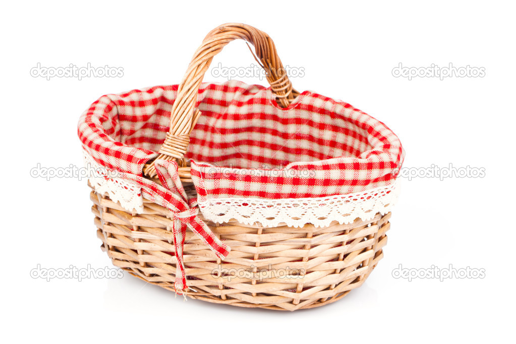 Empty wicker basket with red linen lining, isolated on white bac