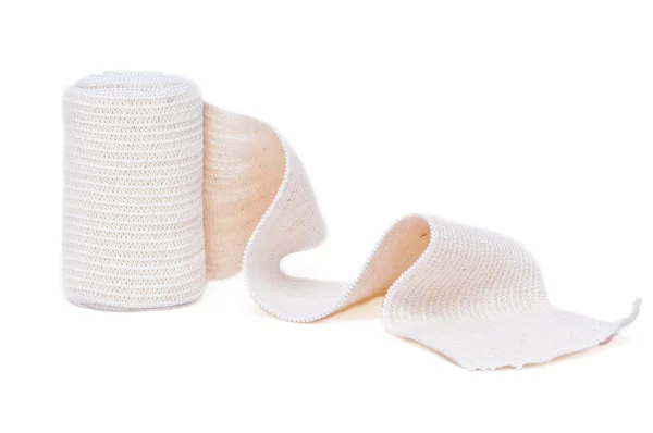 Roll of elastic bandage on white — Stock Photo, Image