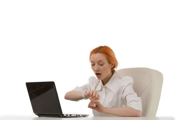 Office worker looking at her watch — Stock Photo, Image
