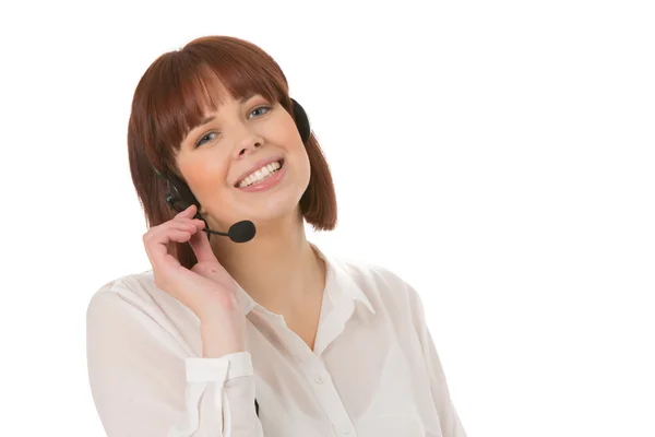 Smiling office worker wearing a headset — Stock Photo, Image