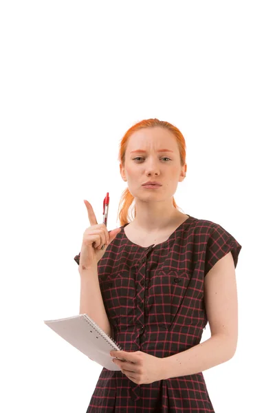 Gondolkodó nő egy notebook tartó — Stock Fotó