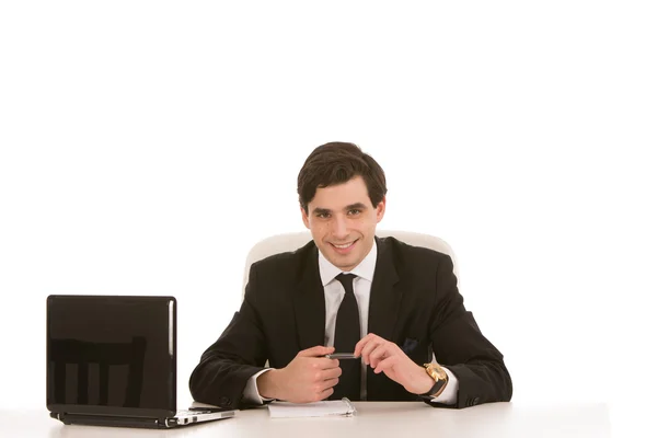 Successful businessman seated at his desk — Stock Photo, Image