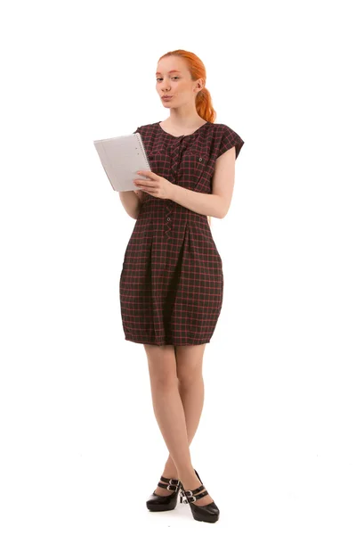 Young woman standing writing — Stock Photo, Image