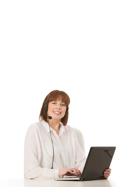 Smiling young call centre operator — Stock Photo, Image