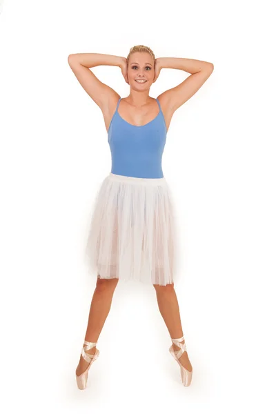 Cute ballerina with her hands to her ears — Stock Photo, Image