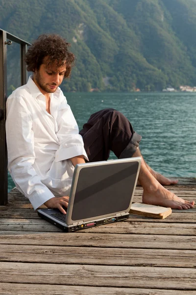 Man writing on the laptop — Stock Photo, Image