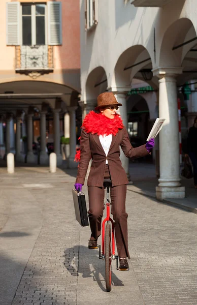 Business woman go to work in monocycle — Stock Photo, Image