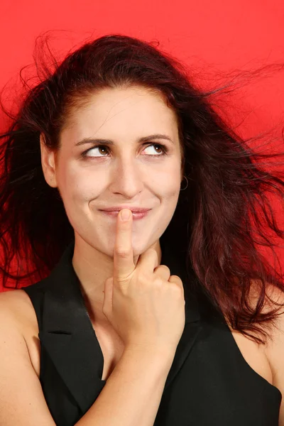 Portrait of woman on red background — Stock Photo, Image