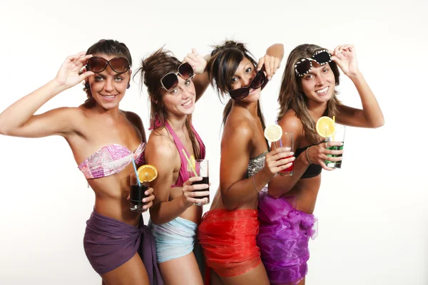 Four girls fun with a drink, portrait in studio, isolated on white background — Stock Photo, Image