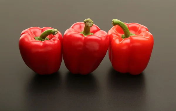 Three red peppers — Stock Photo, Image