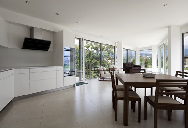 Interior house, large modern kitchen, dining table