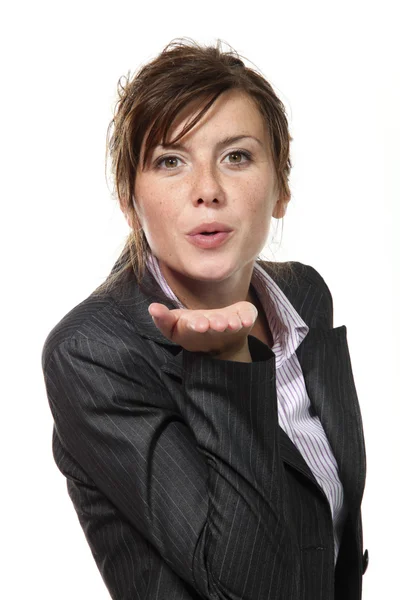 Beautiful businesswoman send a kiss — Stock Photo, Image