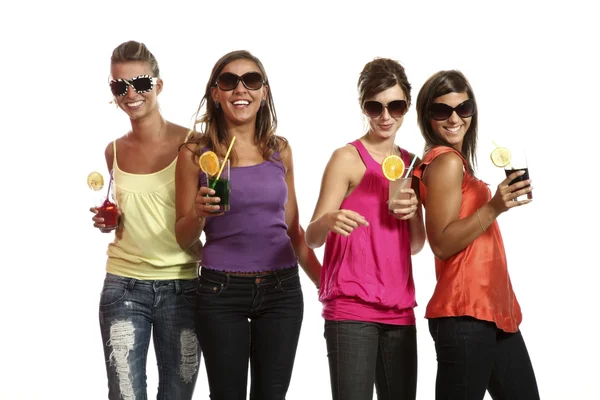 Four girls fun with a drink — Stock Photo, Image