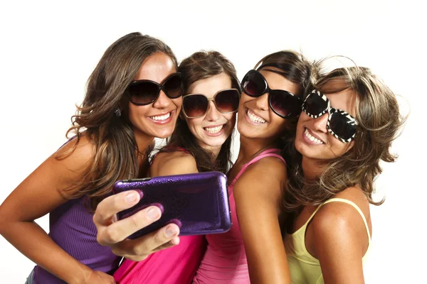 Happy young girls while taking pictures — Stock Photo, Image