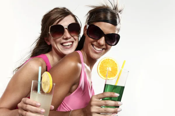 Two girls fun with a drink — Stock Photo, Image