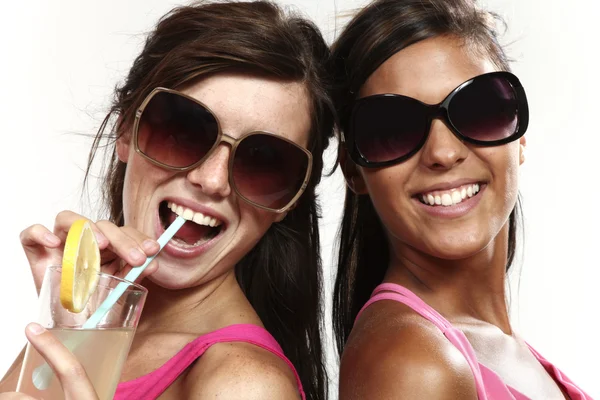 Two girls fun with a drink — Stock Photo, Image