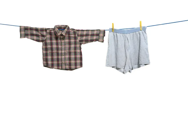 Clothes on clothesline — Stock Photo, Image