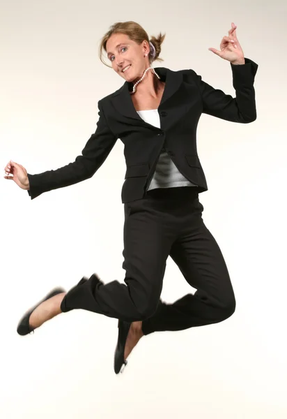 Businesswoman jumping — Stock Photo, Image