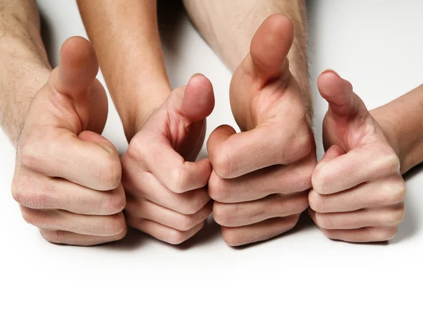 Ręce grupy wyświetlane kciuki — Zdjęcie stockowe