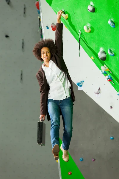 Young business woman hanging at wall, beautiful girl — Stock Photo, Image