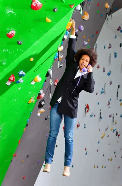 Young business woman hanging at wall, beautiful girl — Stock Photo, Image