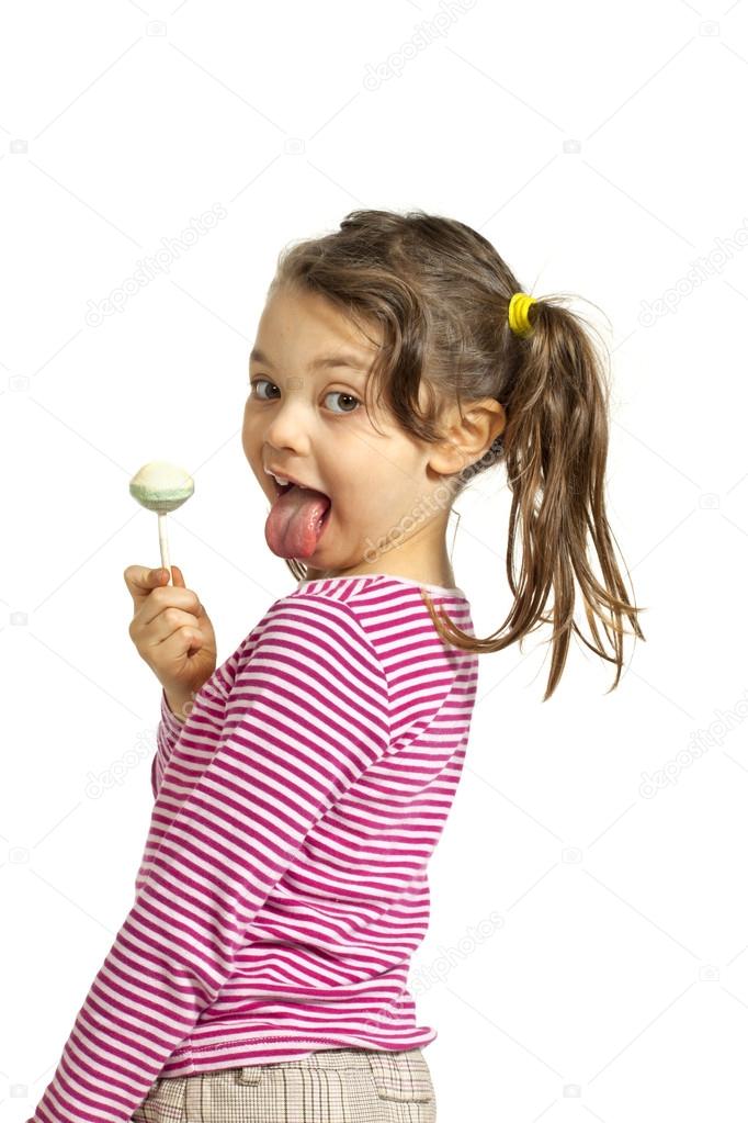 Little girl, lollipop Stock Photo by ©Zveiger 35639423