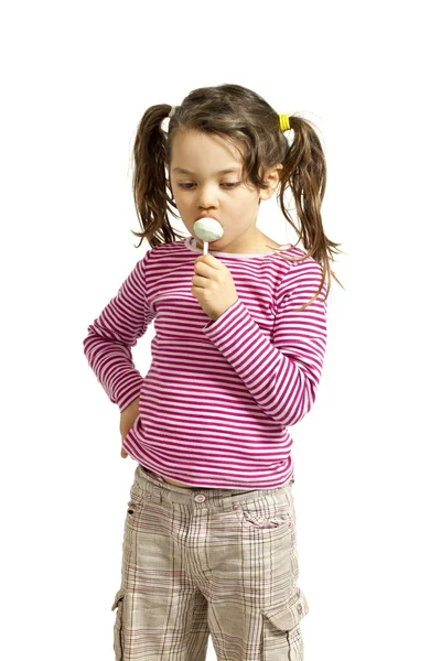 Bambina con un lecca-lecca — Foto Stock