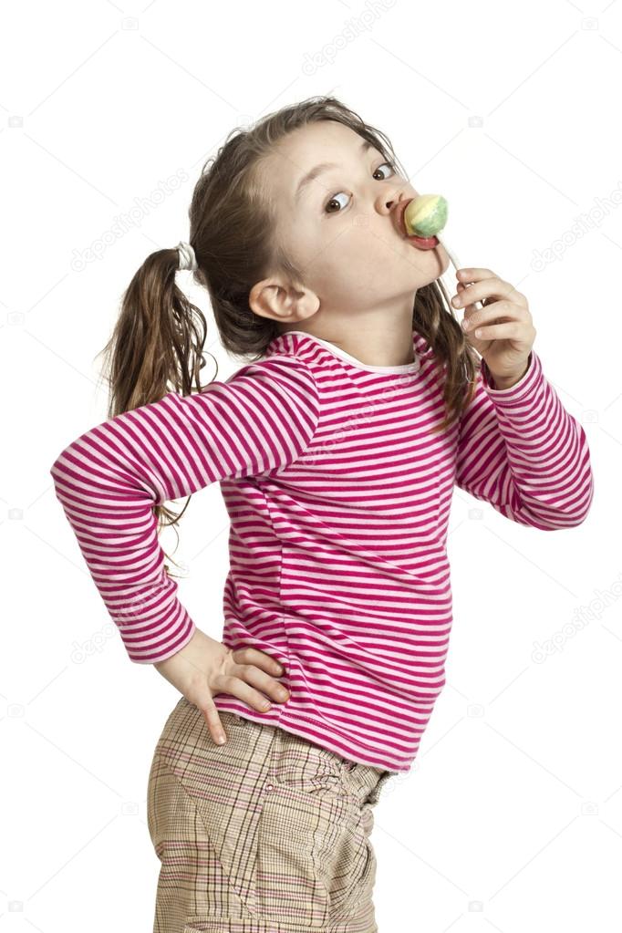 Little girl, lollipop ⬇ Stock Photo, Image by © Zveiger 35640535