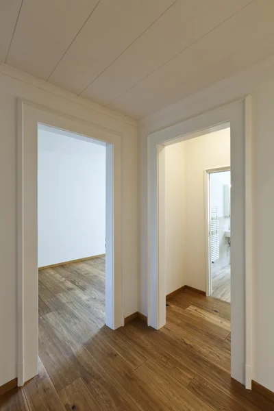 House with wooden floor, passage — Stock Photo, Image