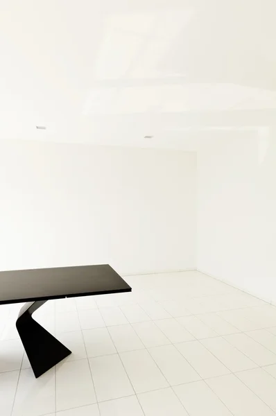 Empty room with black table — Stock Photo, Image