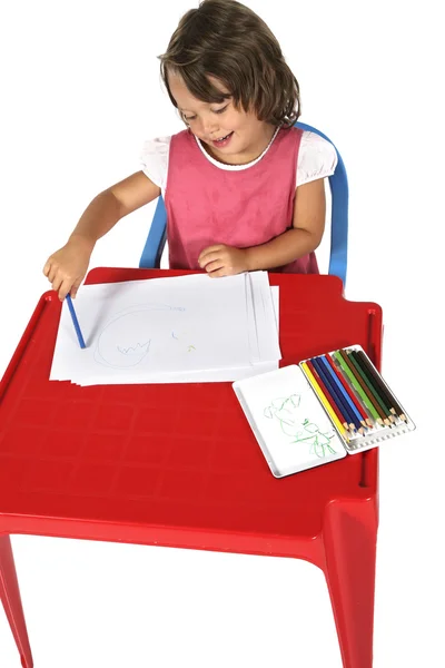 Petite fille dessine avec des crayons — Photo